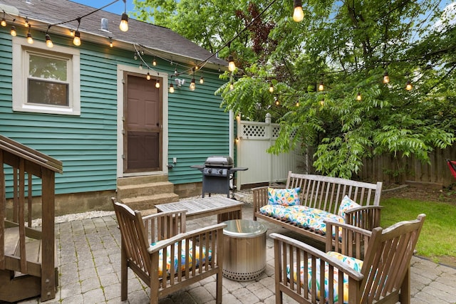 view of patio / terrace featuring an outdoor living space and a grill