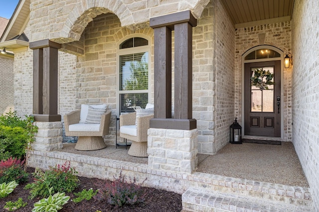 entrance to property featuring a porch