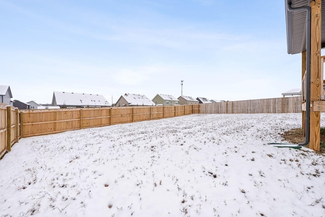 view of snowy yard