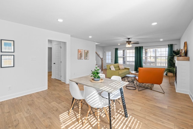 dining area with recessed lighting, stairway, light wood-style flooring, ceiling fan, and baseboards