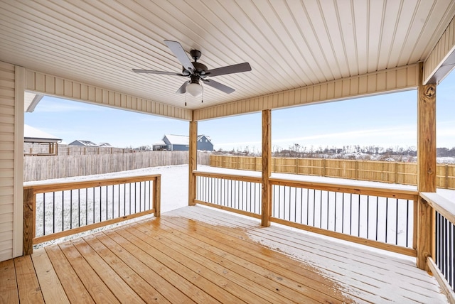 snow covered deck with ceiling fan