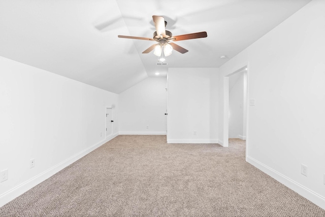 bonus room featuring light colored carpet, ceiling fan, and lofted ceiling