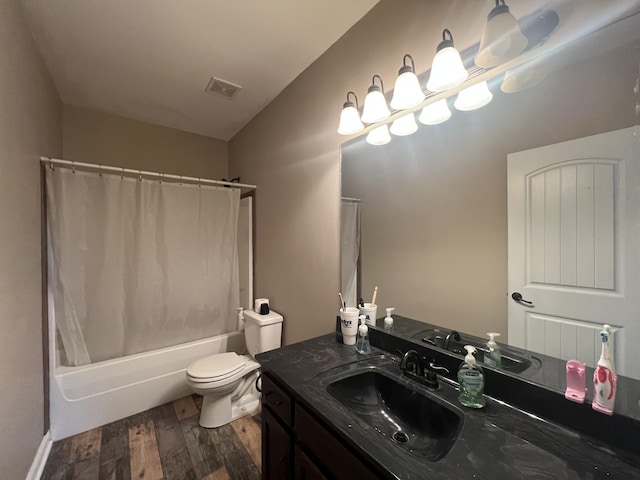 full bathroom featuring toilet, vanity, shower / bath combo, and hardwood / wood-style flooring