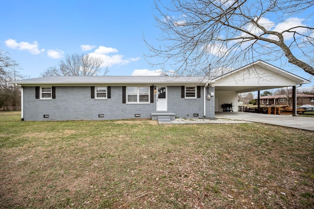 ranch-style home with a front lawn and a carport