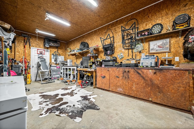 garage with a workshop area