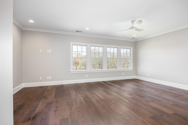 unfurnished room with crown molding, ceiling fan, and dark hardwood / wood-style floors