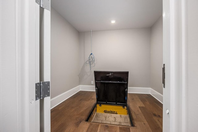 interior space with dark hardwood / wood-style flooring