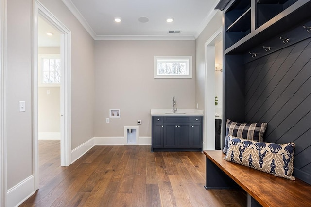 mudroom with hardwood / wood-style floors, sink, and crown molding