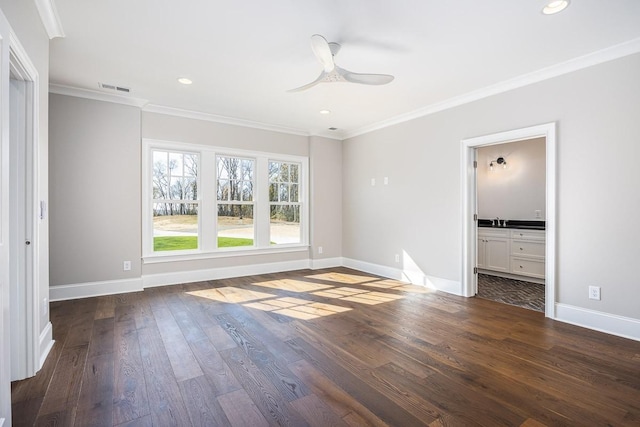 unfurnished bedroom featuring dark hardwood / wood-style flooring, ensuite bath, ceiling fan, crown molding, and sink