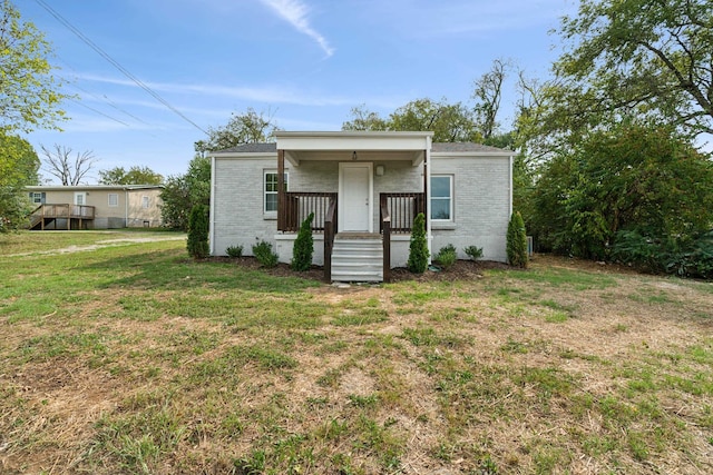 exterior space with a front lawn