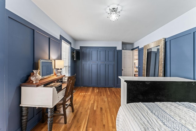 bedroom featuring light hardwood / wood-style floors