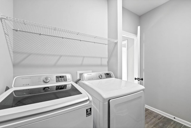 laundry area with independent washer and dryer