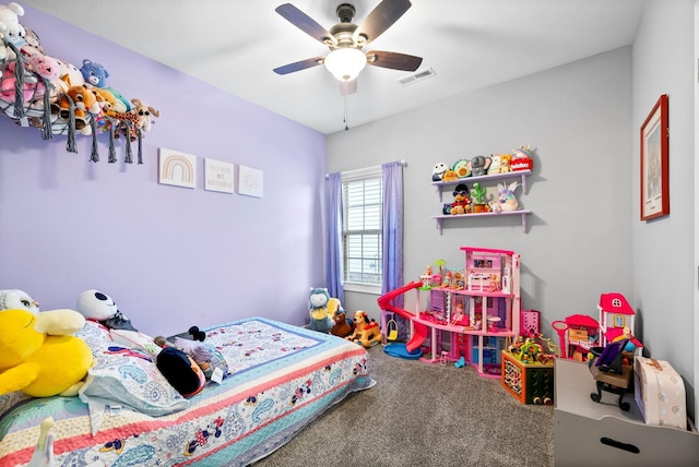 carpeted bedroom with ceiling fan