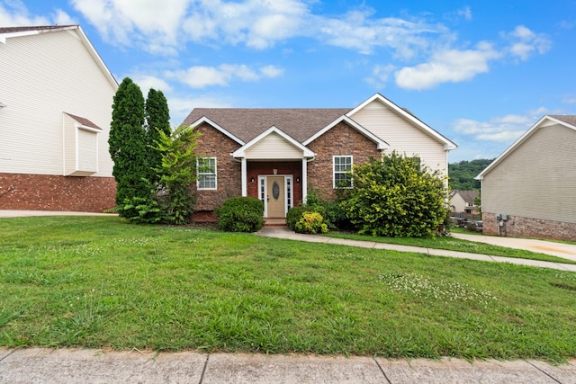 view of front of home with a front lawn