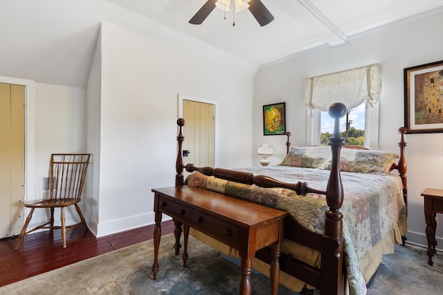 bedroom with ceiling fan, dark hardwood / wood-style flooring, crown molding, and lofted ceiling