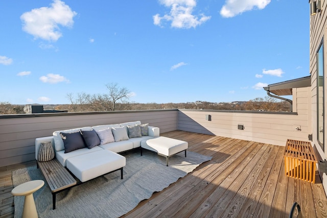 wooden deck featuring outdoor lounge area