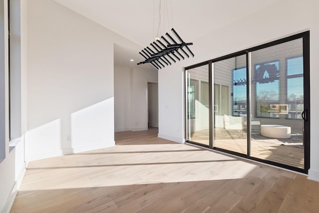 unfurnished room featuring light hardwood / wood-style flooring