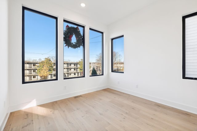 empty room featuring light hardwood / wood-style floors