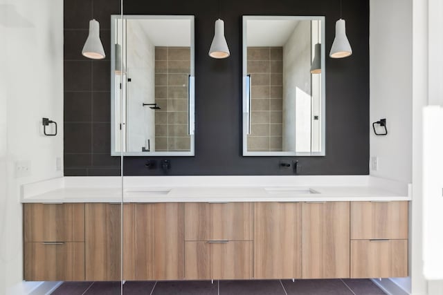 bathroom with vanity and tile patterned floors