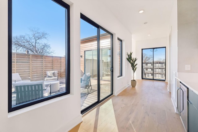 hall featuring light hardwood / wood-style flooring