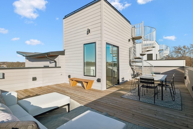 wooden terrace featuring outdoor lounge area