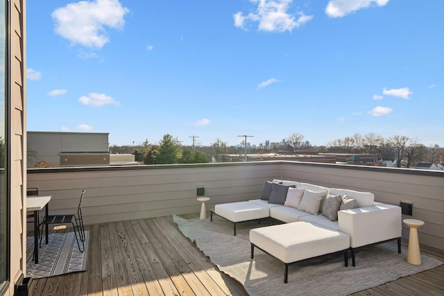 wooden terrace featuring an outdoor hangout area