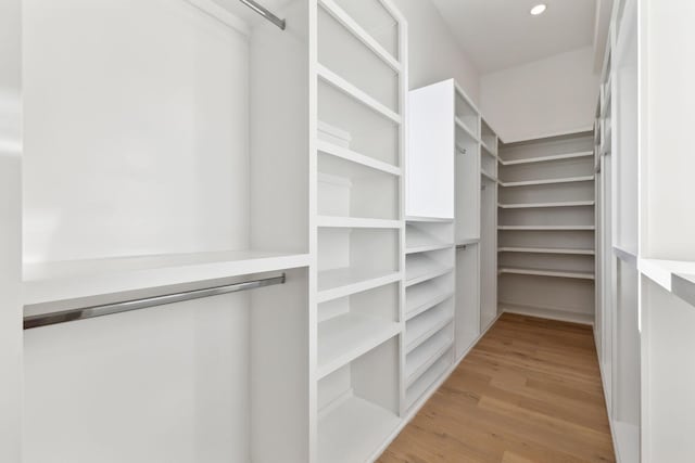 spacious closet featuring light wood-type flooring