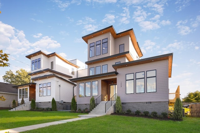 contemporary house with crawl space and a front lawn