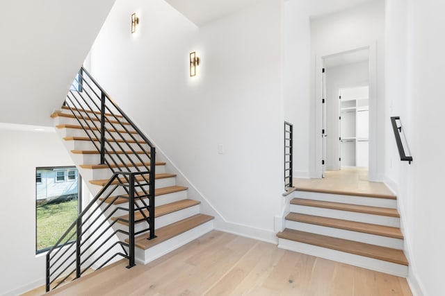 stairs with wood-type flooring