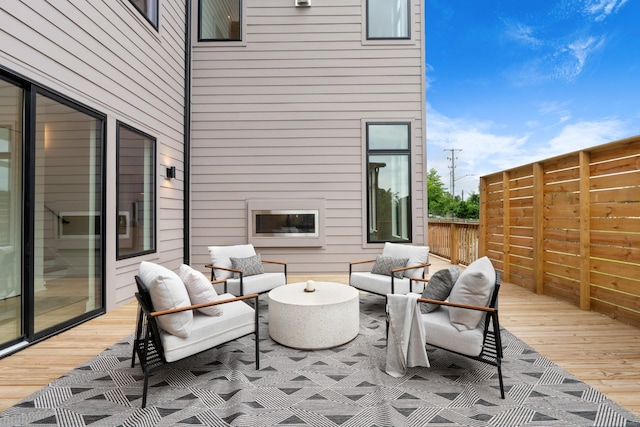 view of patio / terrace featuring an outdoor hangout area and a deck