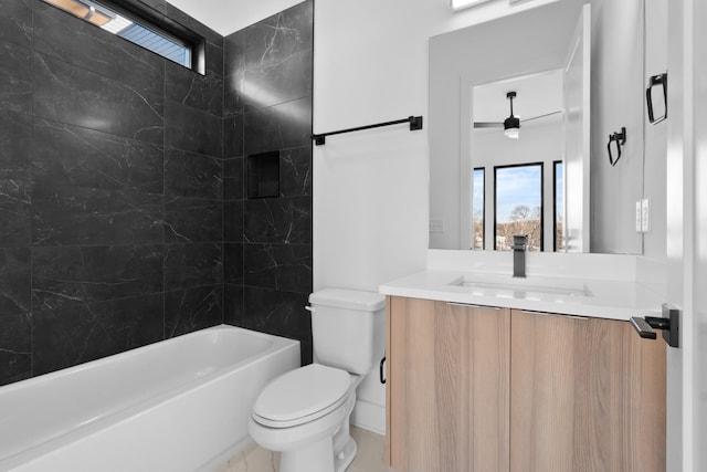 full bathroom with vanity, a healthy amount of sunlight, bathtub / shower combination, and toilet