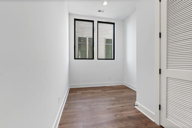 unfurnished room featuring light hardwood / wood-style floors