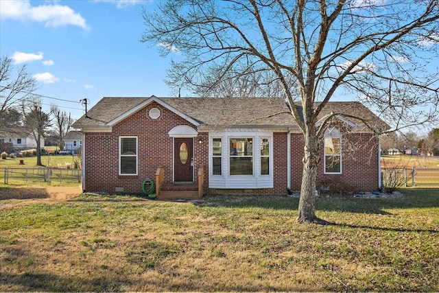 view of front facade featuring a front yard