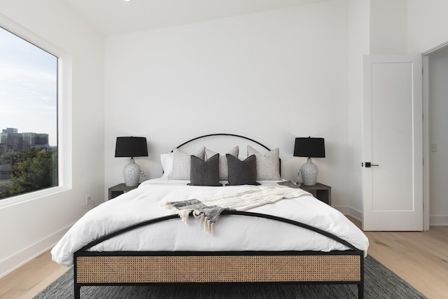 bedroom with wood-type flooring