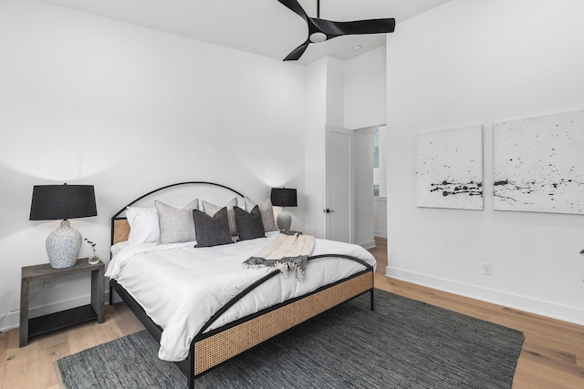 bedroom featuring ceiling fan and wood-type flooring