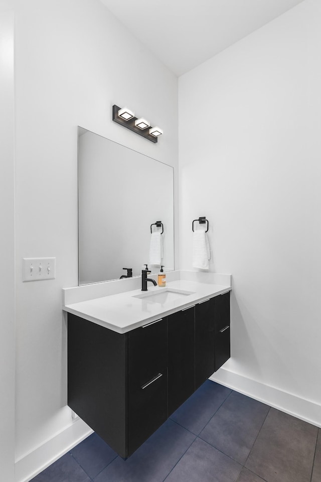 bathroom featuring vanity and tile patterned flooring