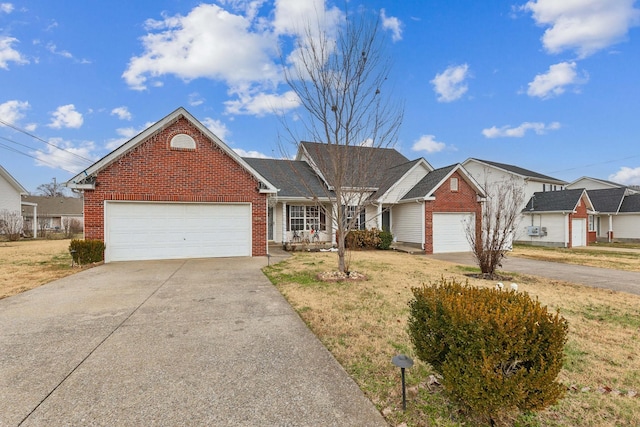 view of front of house with a garage and a front lawn