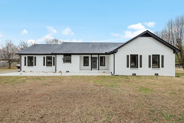 back of house featuring a lawn