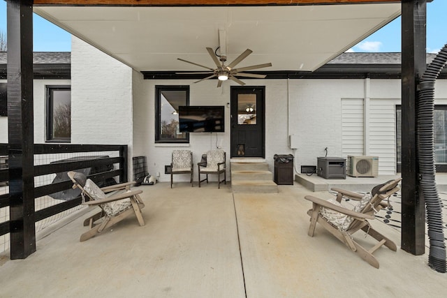 view of patio / terrace with ceiling fan and ac unit