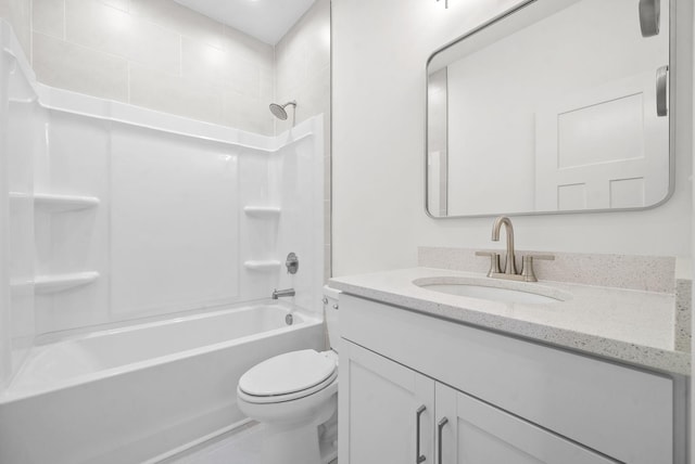 full bathroom with vanity,  shower combination, and toilet