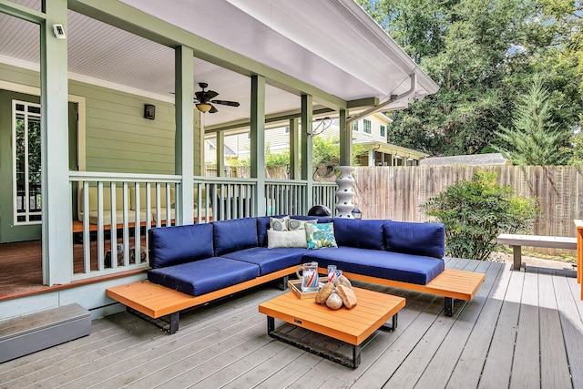 deck with ceiling fan and outdoor lounge area