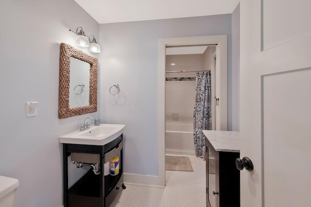 full bathroom with toilet, vanity, shower / tub combo, and tile patterned flooring