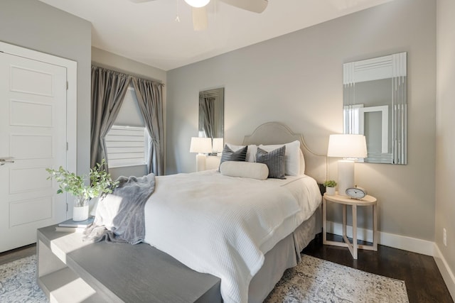 bedroom with ceiling fan and wood-type flooring