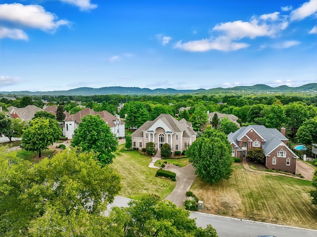 drone / aerial view featuring a mountain view