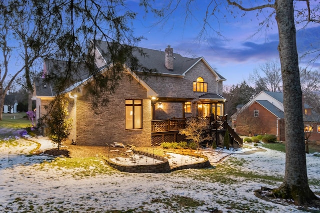 view of front of property with a deck