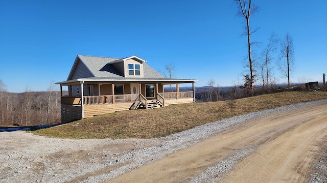 farmhouse-style home with covered porch