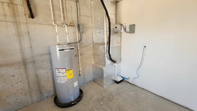 utility room with electric water heater