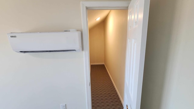 details featuring carpet floors and a wall mounted air conditioner