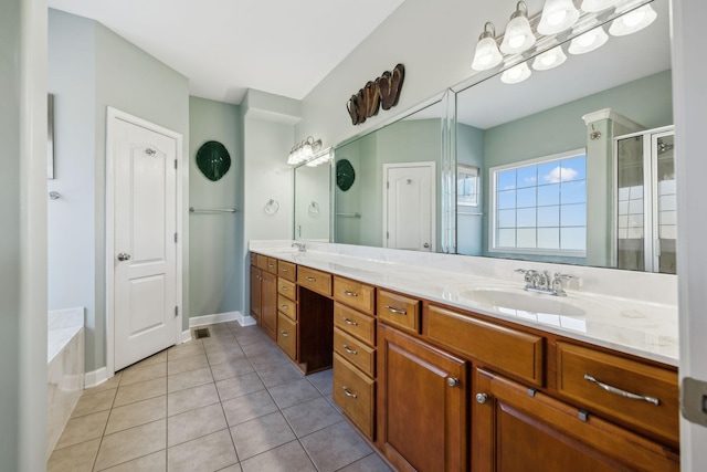 bathroom with vanity, tile patterned flooring, and independent shower and bath