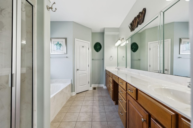 bathroom featuring separate shower and tub, vanity, and tile patterned floors